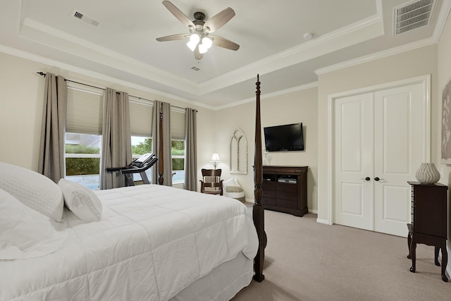 14023 Loramie Creek Ct, Houston, TX 77044 - bedroom with a raised ceiling, light colored carpet, crown molding, and ceiling fan