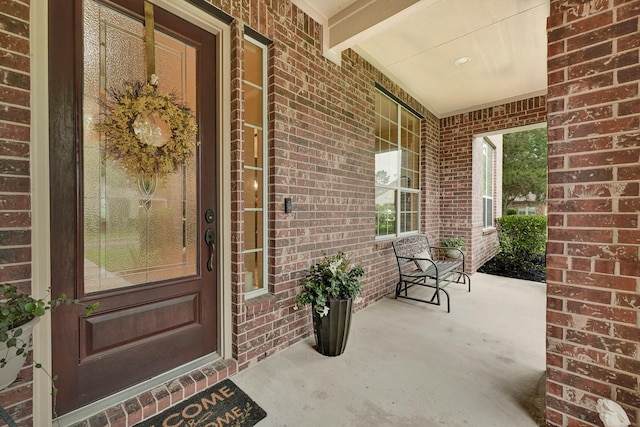 14023 Loramie Creek Ct, Houston, TX 77044 - entrance to property featuring a porch and brick siding