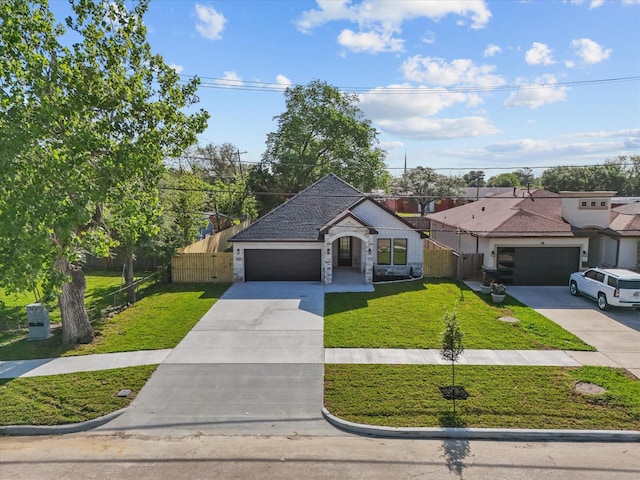 2235 Minnesota St, Houston, TX 77034 - french country style house with stone siding, concrete driveway, and an attached garage