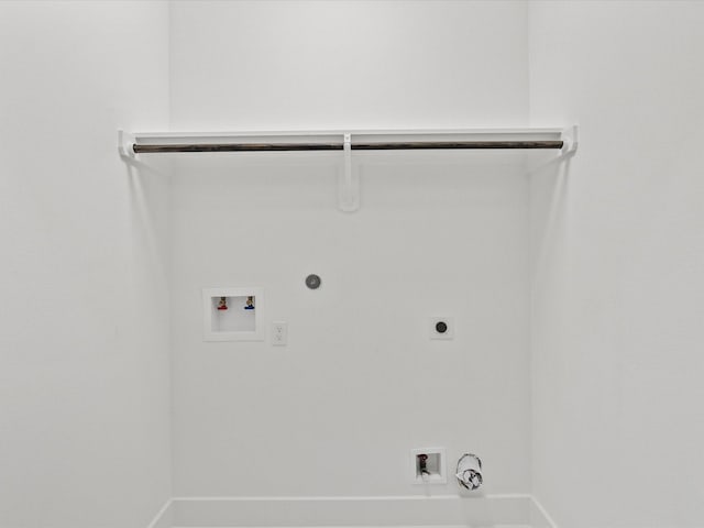 2235 Minnesota St, Houston, TX 77034 - washroom with hookup for a gas dryer, electric dryer hookup, hookup for a washing machine, and baseboards