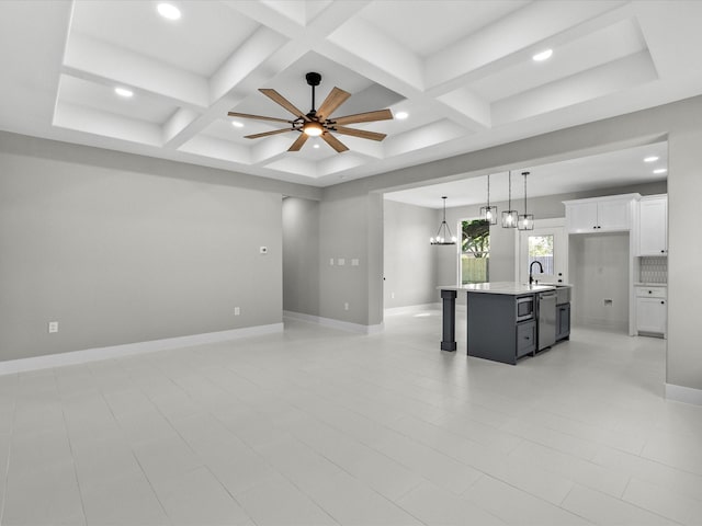 2235 Minnesota St, Houston, TX 77034 - unfurnished living room with coffered ceiling, baseboards, a sink, recessed lighting, and a chandelier