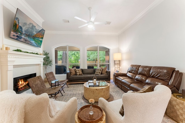 6 Cranberry Bnd, The Woodlands, TX 77381 - living area with crown molding, a tile fireplace, and ceiling fan