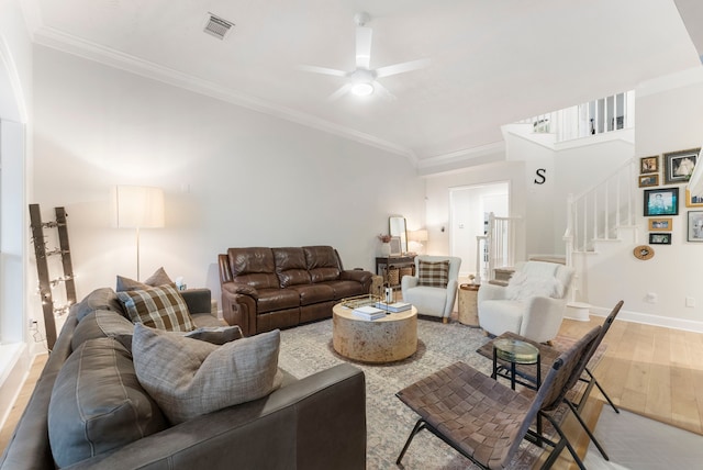 6 Cranberry Bnd, The Woodlands, TX 77381 - living area featuring a ceiling fan, ornamental molding, stairway, wood finished floors, and baseboards