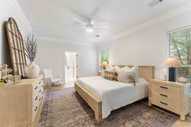6 Cranberry Bnd, The Woodlands, TX 77381 - bedroom featuring crown molding, wood finished floors, ceiling fan, and connected bathroom