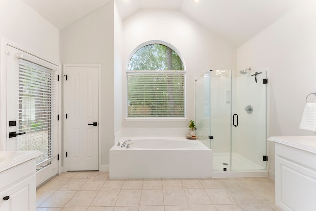 6 Cranberry Bnd, The Woodlands, TX 77381 - full bath with vanity, a shower stall, vaulted ceiling, a bath, and tile patterned floors