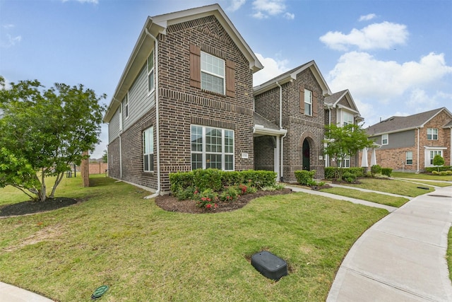 12738 Beatrice Terrace Dr, Humble, TX 77346 - traditional-style house with brick siding and a front yard
