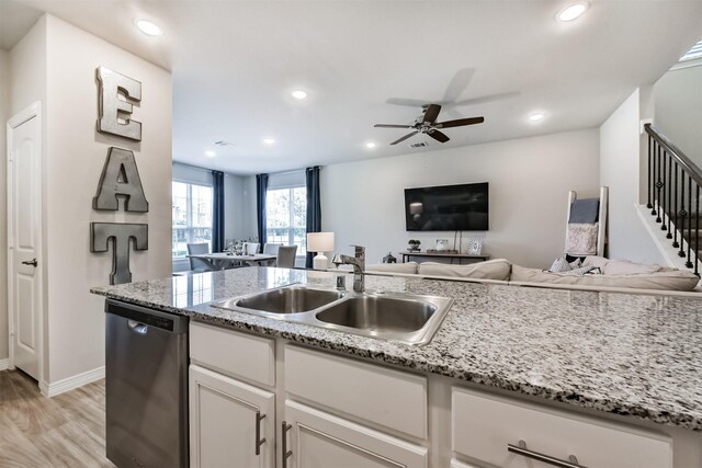 12738 Beatrice Terrace Dr, Humble, TX 77346 - kitchen featuring dishwasher, open floor plan, ceiling fan, light wood finished floors, and recessed lighting