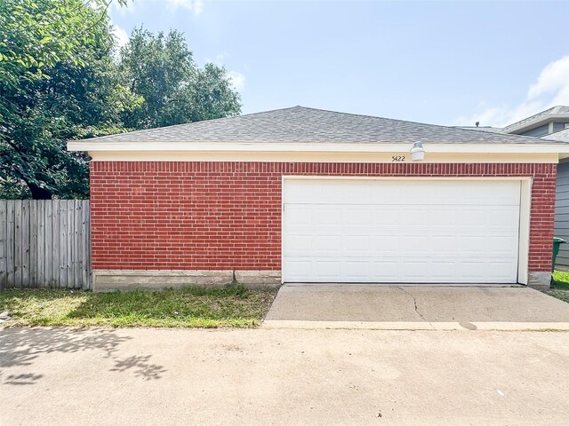 5422 Quail Cove Ln, Houston, TX 77053 - garage featuring driveway