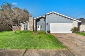 9638 Ravensworth Dr, Houston, TX 77031 - mid-century home with a garage, driveway, and a front lawn