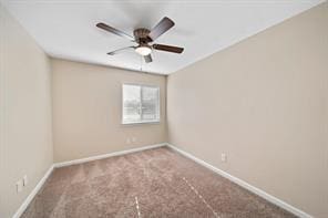 9638 Ravensworth Dr, Houston, TX 77031 - spare room featuring baseboards, carpet floors, and a ceiling fan