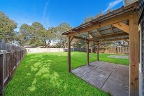 9638 Ravensworth Dr, Houston, TX 77031 - view of yard with a patio area