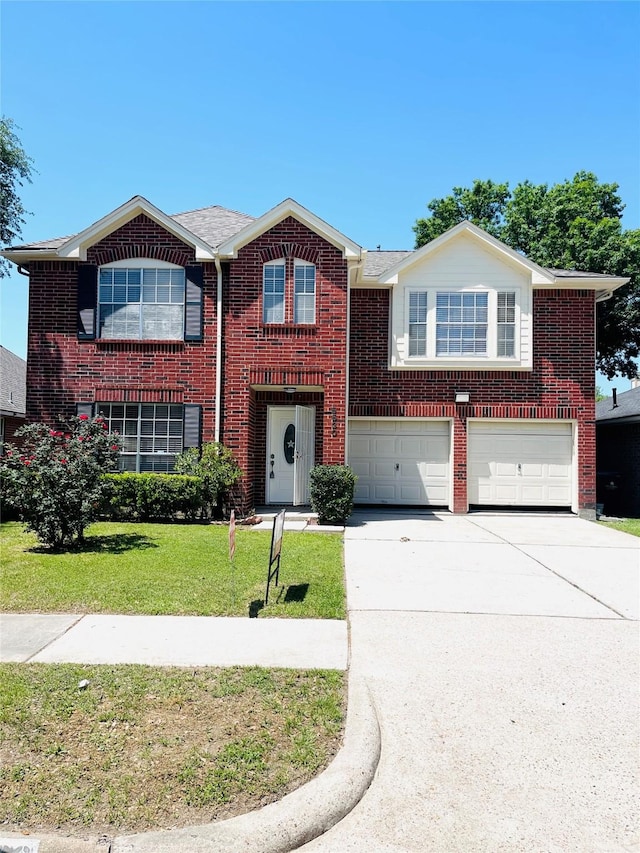 5530 Imperial Grove Dr, Houston, TX 77066 - view of front of property with a garage, driveway, brick siding, and a front lawn