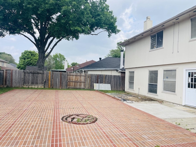 5530 Imperial Grove Dr, Houston, TX 77066 - view of patio featuring a fenced backyard