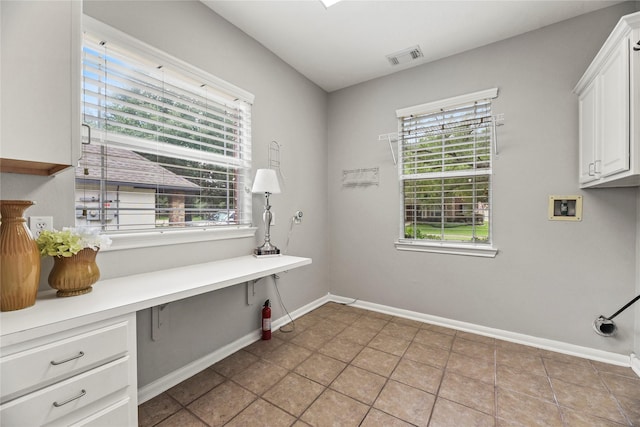 17518 Cypress Laurel St, Houston, TX 77095 - office area featuring plenty of natural light and baseboards