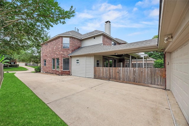 17518 Cypress Laurel St, Houston, TX 77095 - view of property exterior featuring brick siding, a chimney, driveway, a shingled roof, and a garage