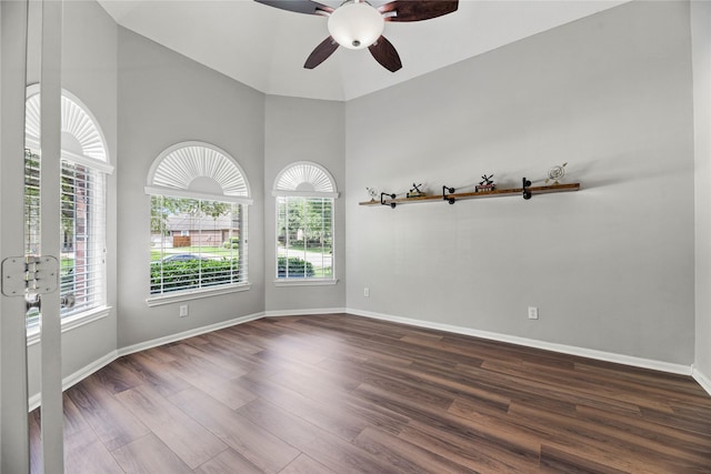 17518 Cypress Laurel St, Houston, TX 77095 - spare room featuring healthy amount of natural light, dark wood-style floors, ceiling fan, a towering ceiling, and baseboards