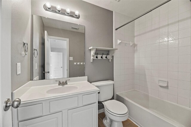 17518 Cypress Laurel St, Houston, TX 77095 - bathroom featuring toilet, bathtub / shower combination, and vanity