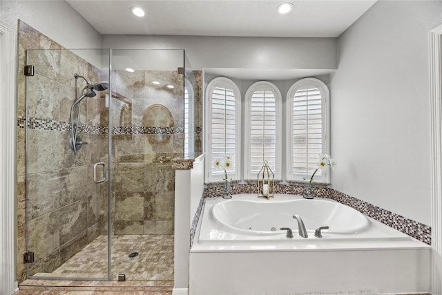 17518 Cypress Laurel St, Houston, TX 77095 - full bathroom featuring a jetted tub, a shower stall, and recessed lighting