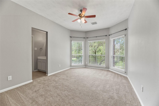 17518 Cypress Laurel St, Houston, TX 77095 - carpeted empty room with ceiling fan and baseboards