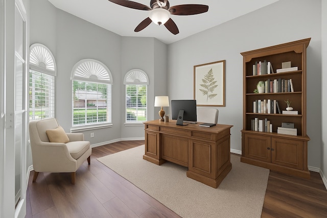 17518 Cypress Laurel St, Houston, TX 77095 - office space with dark wood-style flooring, a ceiling fan, and baseboards