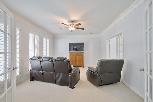 13210 Sycamore Heights St, Houston, TX 77065 - carpeted living area with ceiling fan, baseboards, ornamental molding, and french doors