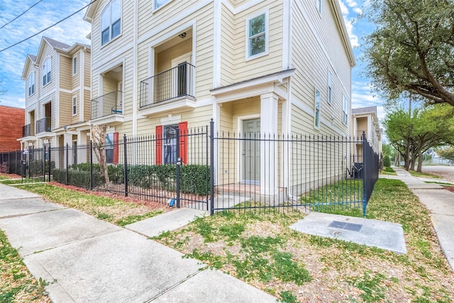 1119 Palmer St, Houston, TX 77003 - view of home's exterior featuring a fenced front yard