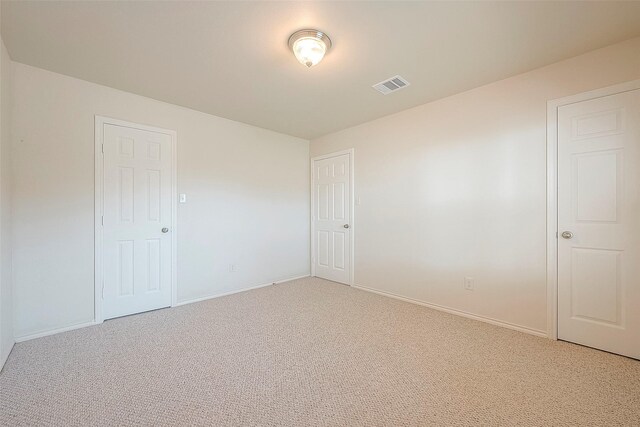 1119 Palmer St, Houston, TX 77003 - spare room with light colored carpet and baseboards