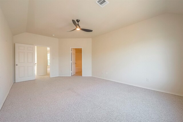 1119 Palmer St, Houston, TX 77003 - unfurnished bedroom with vaulted ceiling, light colored carpet, baseboards, a spacious closet, and a ceiling fan