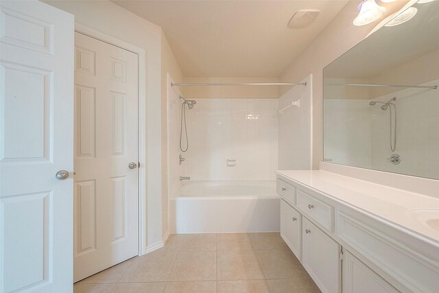 1119 Palmer St, Houston, TX 77003 - bathroom featuring tile patterned flooring, vanity, and bathtub / shower combination