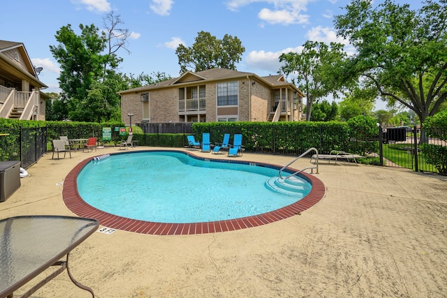 1311 Antoine Dr Unit 111, Houston, TX 77055 - community pool featuring fence and a patio area