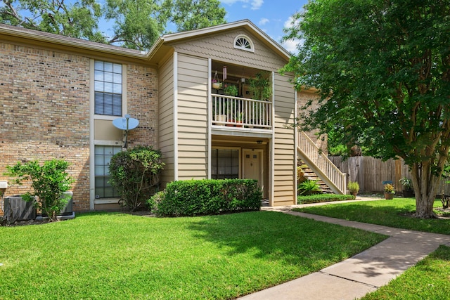 1311 Antoine Dr Unit 111, Houston, TX 77055 - view of property featuring stairway and brick siding