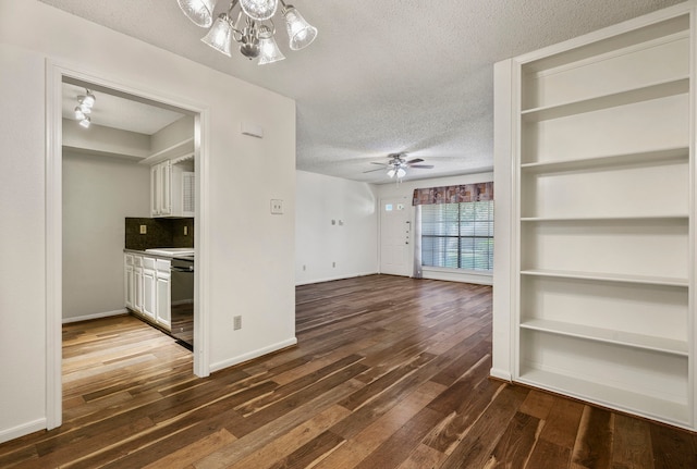 1311 Antoine Dr Unit 111, Houston, TX 77055 - unfurnished living room with a textured ceiling, a chandelier, dark wood finished floors, ceiling fan, and baseboards