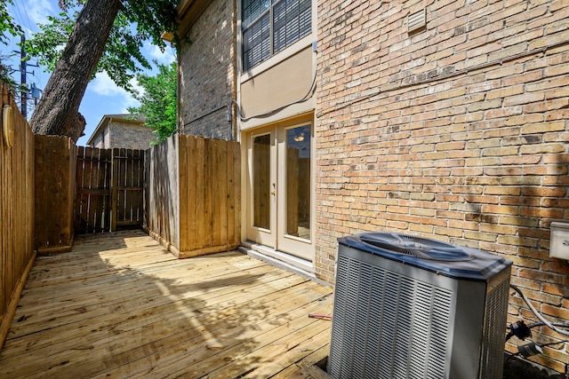 1311 Antoine Dr Unit 111, Houston, TX 77055 - deck featuring french doors, central AC, and fence
