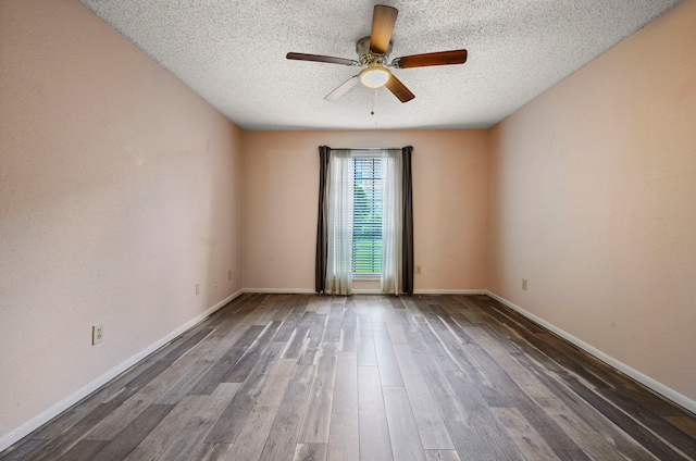 1311 Antoine Dr Unit 111, Houston, TX 77055 - empty room featuring ceiling fan, a textured ceiling, wood finished floors, and baseboards