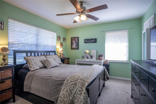 1803 Foxwood Rd, Houston, TX 77008 - bedroom with multiple windows, light carpet, and ceiling fan