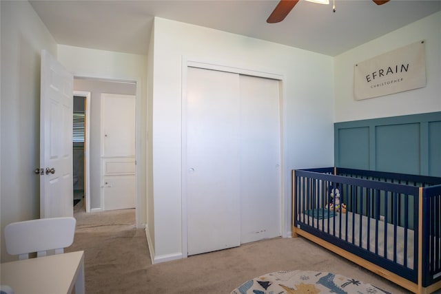 1803 Foxwood Rd, Houston, TX 77008 - unfurnished bedroom featuring carpet floors, a closet, a nursery area, and a ceiling fan