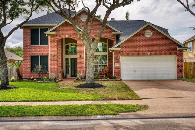 1114 Carriage Ct, Seabrook, TX 77586 - traditional home featuring a garage, brick siding, concrete driveway, and roof with shingles