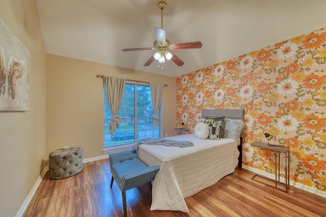 1114 Carriage Ct, Seabrook, TX 77586 - bedroom with wallpapered walls, baseboards, wood finished floors, ceiling fan, and access to outside