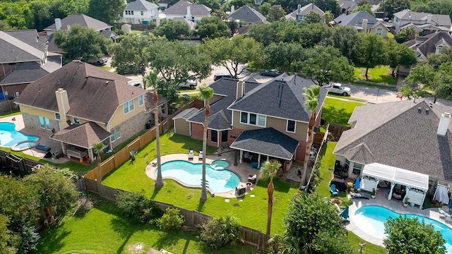 1114 Carriage Ct, Seabrook, TX 77586 - aerial perspective of suburban area with a pool