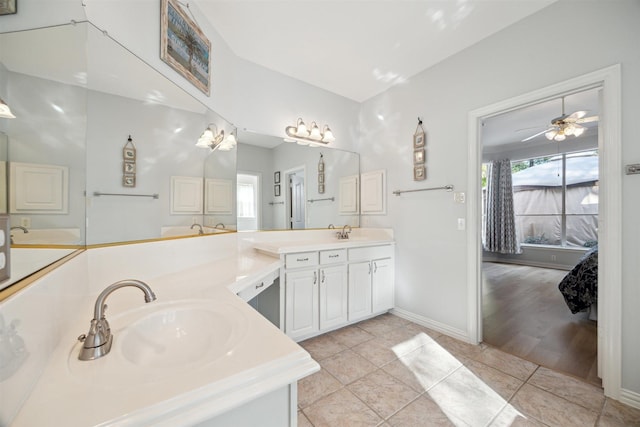 2 Slatestone Cir, The Woodlands, TX 77382 - bathroom featuring double vanity, plenty of natural light, tile patterned floors, and ceiling fan