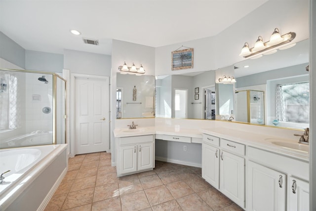 2 Slatestone Cir, The Woodlands, TX 77382 - bathroom featuring double vanity, a stall shower, and a garden tub