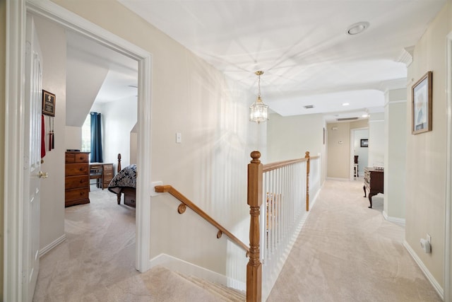 2 Slatestone Cir, The Woodlands, TX 77382 - hall with an upstairs landing, light carpet, and baseboards