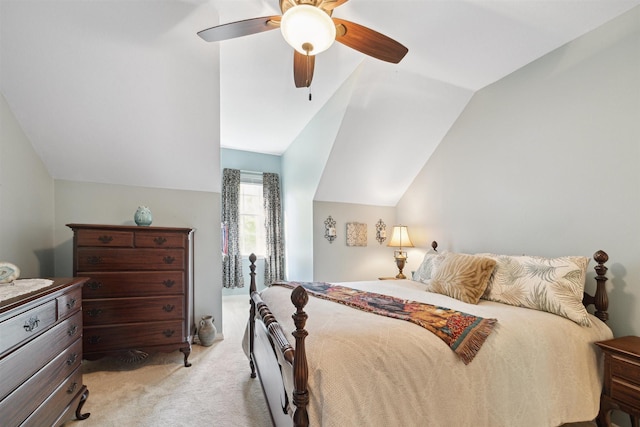 2 Slatestone Cir, The Woodlands, TX 77382 - bedroom with light colored carpet, vaulted ceiling, and a ceiling fan