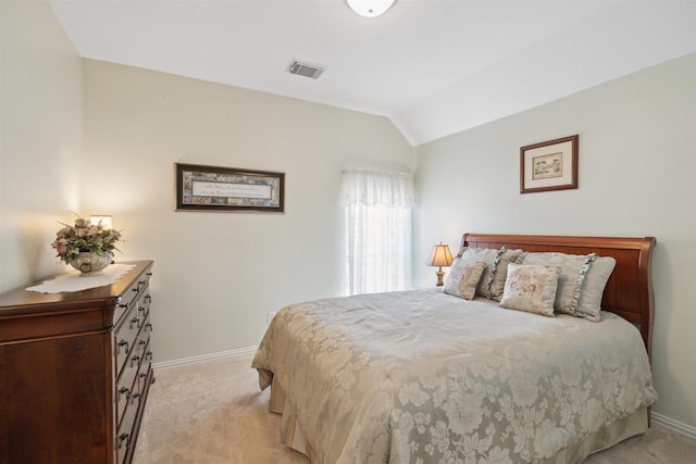 2 Slatestone Cir, The Woodlands, TX 77382 - bedroom featuring light carpet, lofted ceiling, and baseboards
