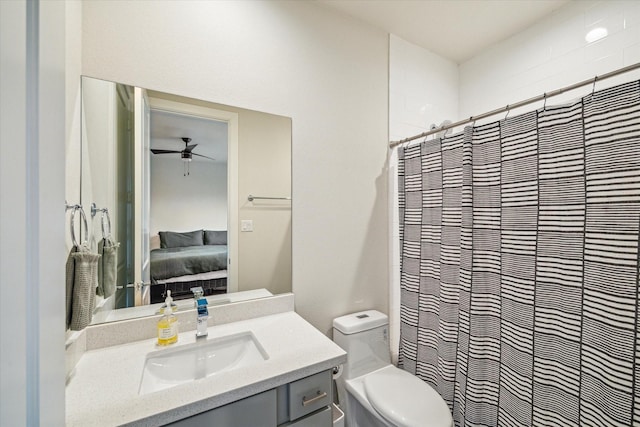 1808 Northwood St Unit A, Houston, TX 77009 - ensuite bathroom featuring vanity, a ceiling fan, toilet, and a shower with shower curtain
