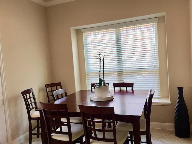 4435 Calvet Forest Dr, Katy, TX 77494 - dining area with baseboards, healthy amount of natural light, and light tile patterned flooring