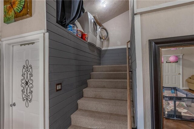 6443 Hardy Weedon Rd, College Station, TX 77845 - staircase with lofted ceiling and wood walls