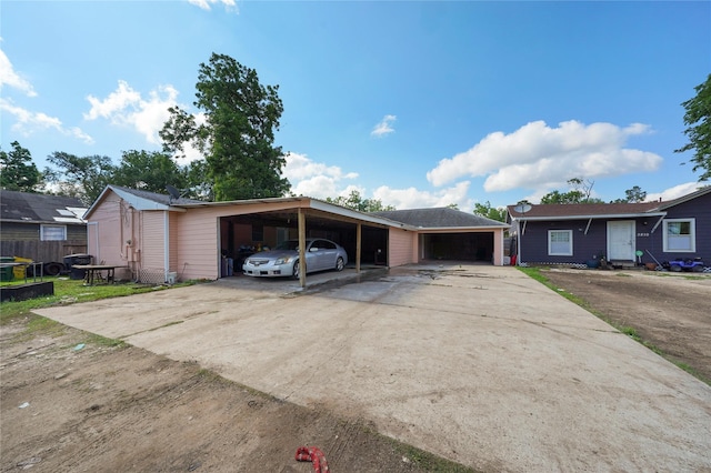 3810 Hurley St, Houston, TX 77093 - view of parking / parking lot featuring a carport and driveway