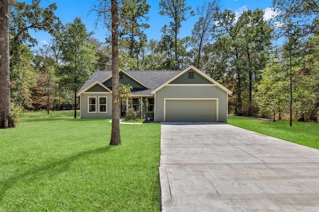 247 Mistletoe, Onalaska, TX 77360 - view of front of house with an attached garage, concrete driveway, a front yard, and a shingled roof