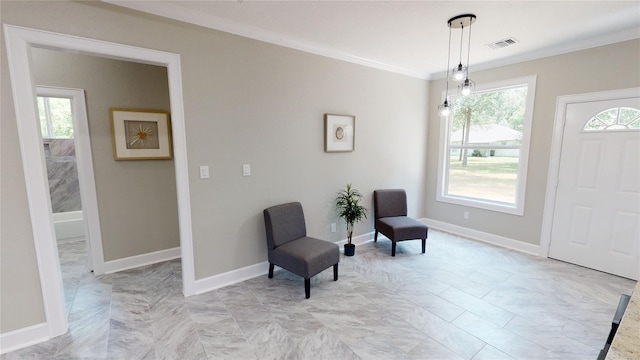 247 Mistletoe, Onalaska, TX 77360 - living area featuring crown molding, light marble finish floors, and baseboards